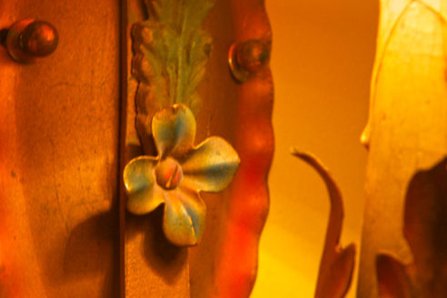 Painted detail of vintage sconce.
