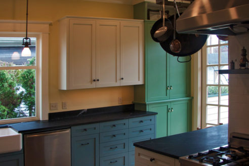 Custom, hand painted, cabinetry and hardware.